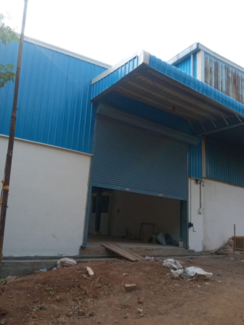 Loading bay with roll-up shutter & canopy